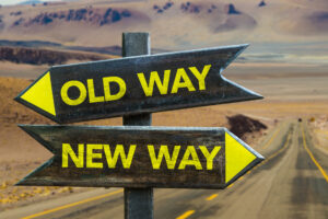 A crossroad sign: old way or new way