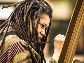 an artist painting a picture