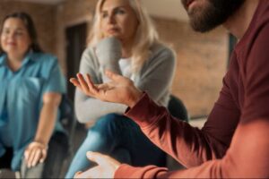 a group of people sitting at home