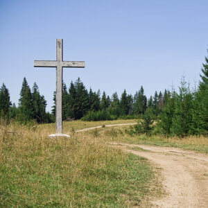 a road that passes a cross
