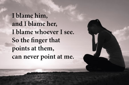 A women in sorrowful reflection
